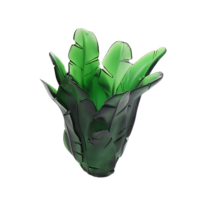 Vaso in vetro con foglia di banana verde per decorazione domestica