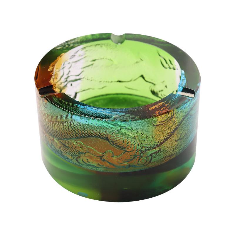 Posacenere in vetro con motivo drago uscito dal mare