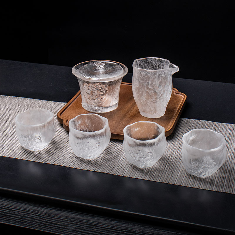 Set di tazze da tè trasparenti con coperchi