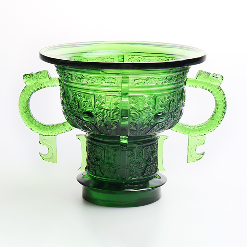 Treppiede cinese con manico a forma di orecchie di drago e motivo a spine