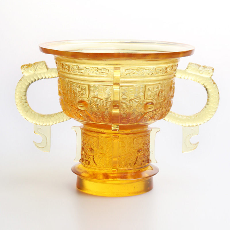 Treppiede cinese con manico a forma di orecchie di drago e motivo a spine